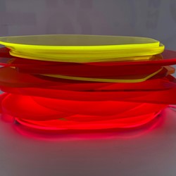 Pamela Gaunt, Fandango I (Illuminated Horizontal Stack), 2023, laser-cut and assembled Plexiglass and Perspex off-cuts from Not Quite Wabbly and vinyl tape, 11 x 25 x 25cm
