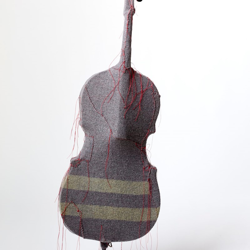 Apo, 2024, repurposed cello, mixed media, 127 x 40 x 12cm